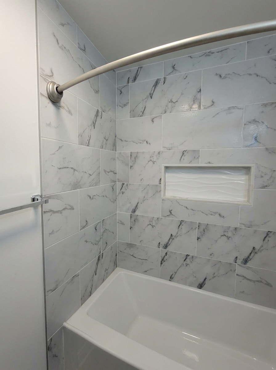 Bathroom renovation and custom tile work by HBO Construction
